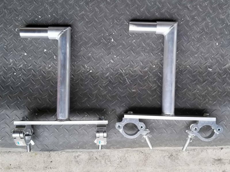 a stand or mounting system designed to hold speakers